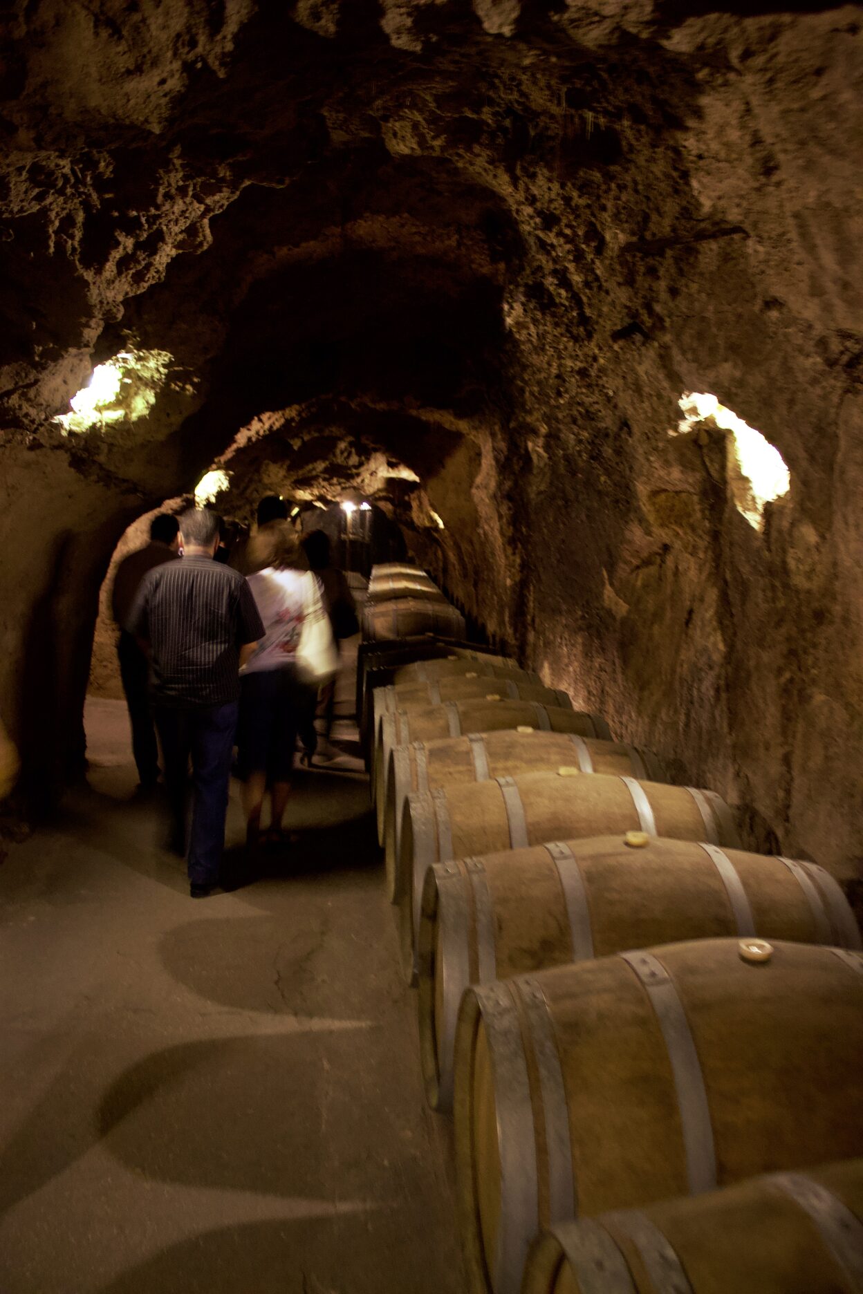 A cave with wine barrels at Chateau Ksara