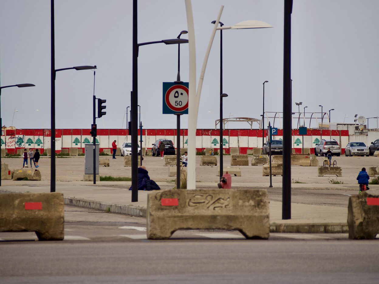 Cement barriers painted with the Lebanese flag, on the coast of Beirut.