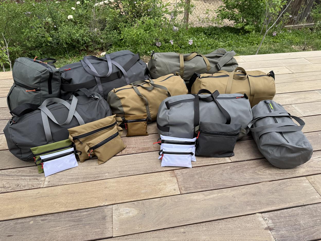 A lot of duffel bags, made by Zef Houssney