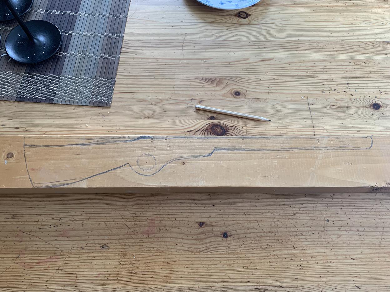 Sketched out a rifle shape on a 2x4
