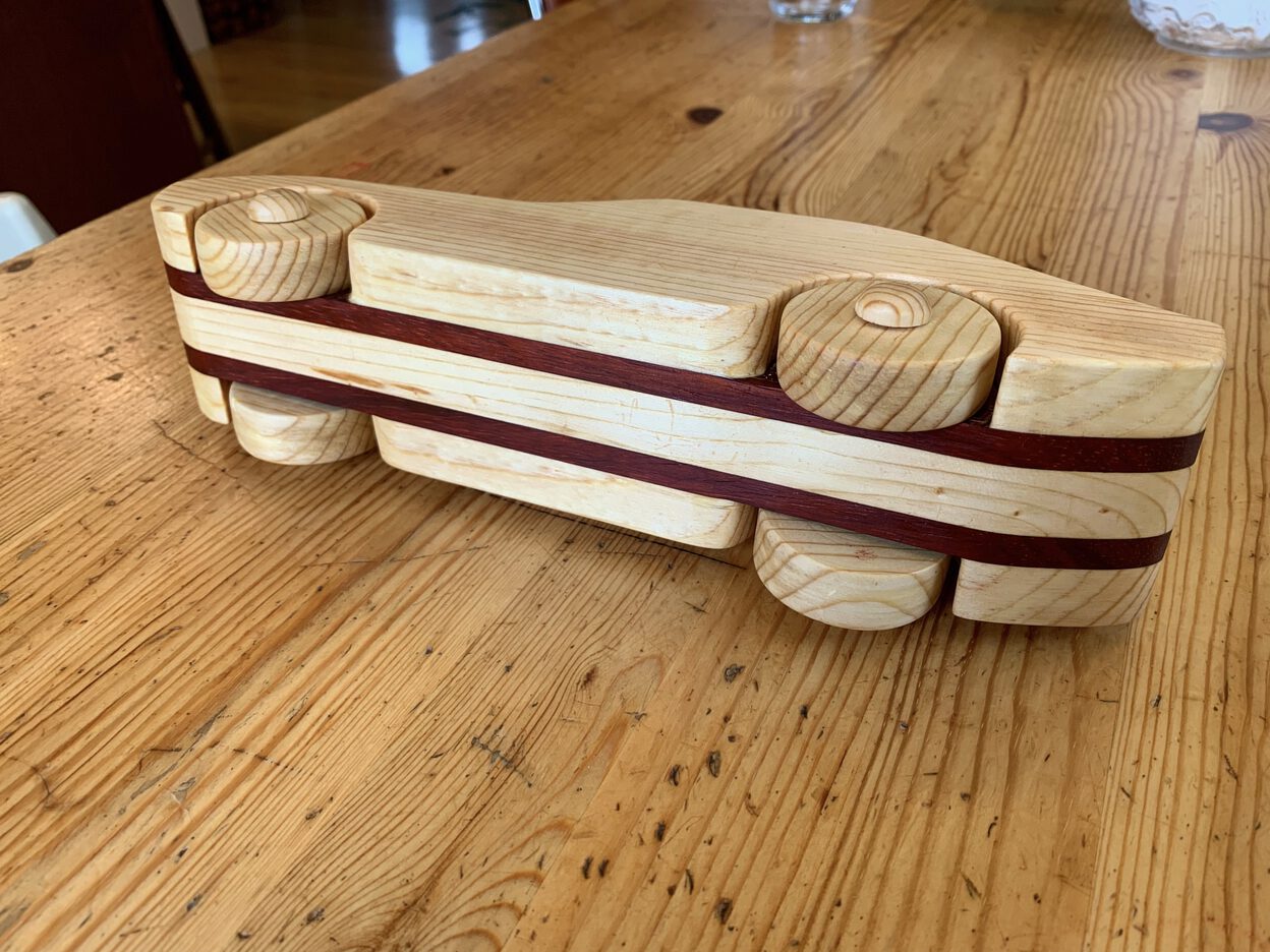 The bottom of the wooden car.